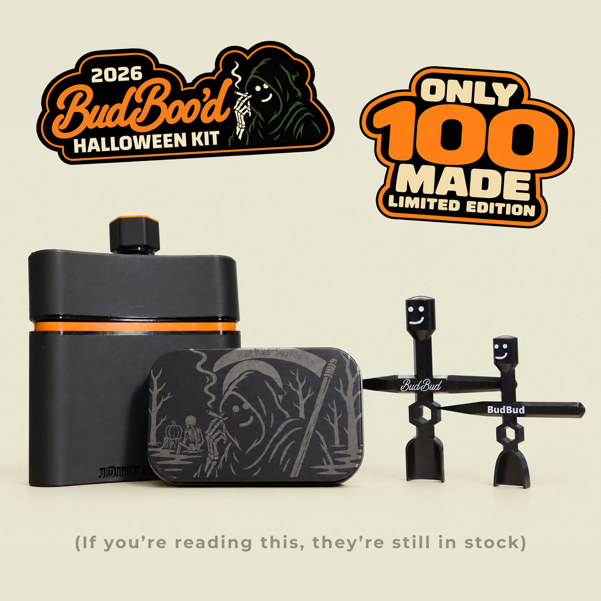 BudBood 2026 Halloween Kit featuring a matte black flask with an orange band, a matching rectangular tin with a grim reaper illustration, and two black plastic tools branded BudBood, set against a light beige background with promotional badges.